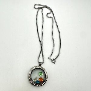 18" Stainless steel floating locket necklace with three cz stones and letter A!